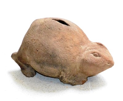 Lot 49 - A Terracotta Money Box, probably Eastern Java, in the form of a crouching toad, 27cm wide