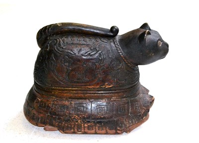 Lot 64 - A Chinese Wooden Box and Cover, 19th century, formed as a cat sitting on a tortoise, carved...