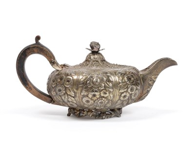 Lot 121 - A George III Silver Gilt Bachelor's Teapot, maker's mark JA, London 1777, of compressed...