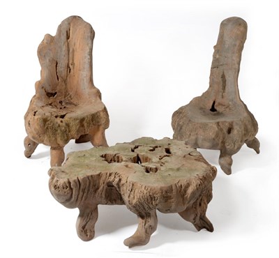 Lot 261 - Two Garden Chairs, of naturalistic form, carved and formed from a tree trunk with back support...