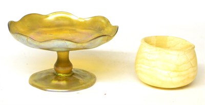 Lot 267 - A Roman Style Amber Glass Tazza, 15.5cm diameter; and An Alabaster Bowl, possibly Egyptian, 9cm (2)