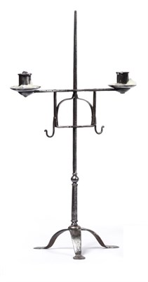 Lot 288 - A Steel Two-Light Candelabrum, 17th/18th century, with adjustable scroll branches on a knopped stem