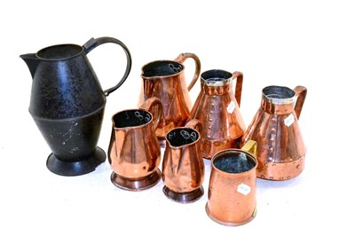 Lot 302 - A Pair of Arts & Crafts Style Silver Plate Mounted Copper Jugs, of conical form with angular...