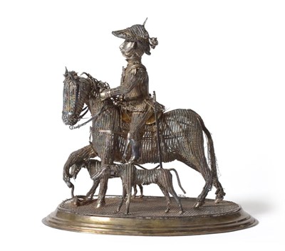 Lot 320 - A Silver Filigree Model, probably Italian, 20th century, unmarked, as a soldier in military uniform