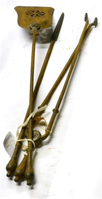 Lot 365 - A Set of Three Steel Fire Irons, 19th century, with baluster knops, comprising shovel, poker...