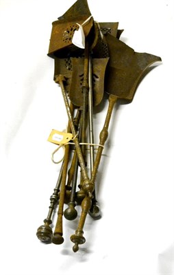 Lot 382 - A Steel Fire Shovel, early 19th century, with pierced geometric decoration, baluster knop stem...