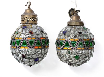 Lot 392 - A Pair of Leaded Coloured Glass Lanterns, 20th century, of ovoid form with geometric...