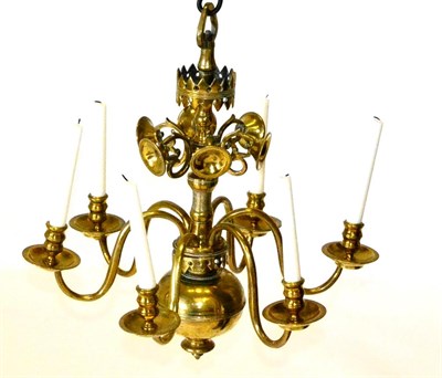 Lot 395 - A Brass Six-Light Chandelier, in 17th century style, the baluster stem applied with scrolls and...