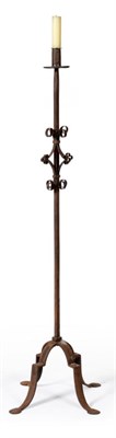 Lot 403 - A Wrought Iron Candle Stand, in 16th century style, with strapwork collar, on scroll supports,...