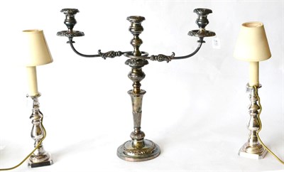 Lot 410 - A Silver Plated Three Branch Candelabra, with typical reeded arms and foliate scroll...