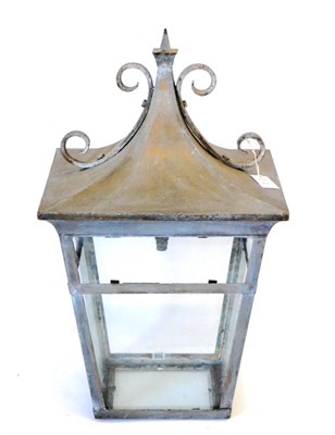 Lot 416 - A Painted Iron and Glazed Lantern, of recent date, the pagoda top with scrolling mounts, 85cm high