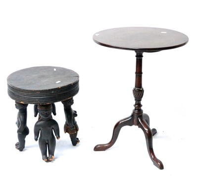 Lot 420 - A George III Mahogany Tripod Table, with circular top, 53cm diameter; and An African Stool or...