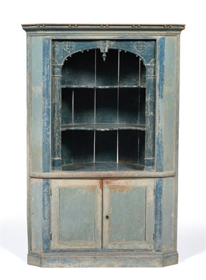 Lot 427 - A 19th Century Blue Painted Pine Standing Corner Cupboard, an ogee cornice over an arched...