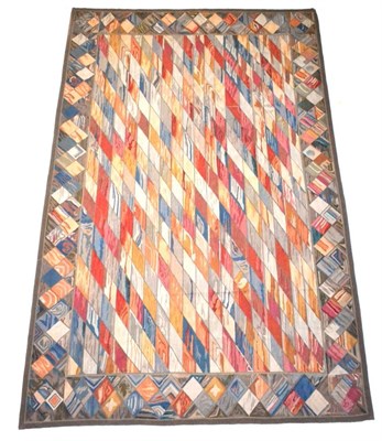 Lot 438 - Modernist Kilim The polychrome diamond lattice field enclosed by similar borders, 568cm by 362cm