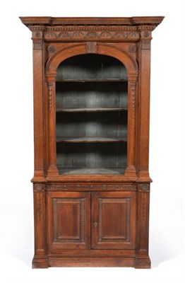 Lot 440 - A Stained Pine Display Cabinet, of architectural form, with a dentilled cornice and lunette...