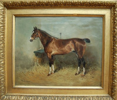 Lot 812 - William Woodhouse (1857-1939) Bay hunter standing in a loose box Signed Woodhouse, oil on...