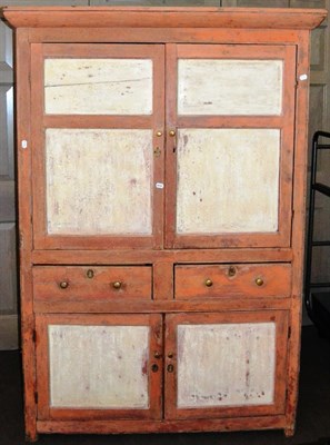 Lot 446 - A 19th Century Pine Cupboard, painted tangerine and cream, with a moulded cornice over two panelled