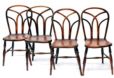 Lot 447 - A Matched Set of Four 19th Century Ash and Elm Windsor Chairs, with arched backs and interlaced...