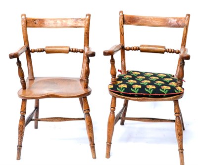 Lot 453 - A Pair of 19th Century Ash Windsor Armchairs, with scrolled bar backs and tabletted mid-rails,...