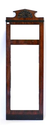 Lot 454 - An Empire Style Pier Glass, in a mahogany frame, the triangular pediment with an applied...