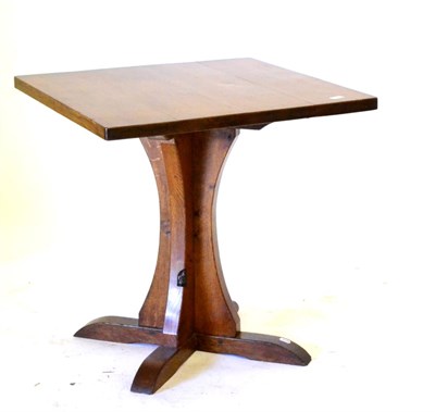 Lot 471 - A Thomas ''Gnomeman'' Whittaker Oak Table, with a square top, on a cruciform base, with carved...