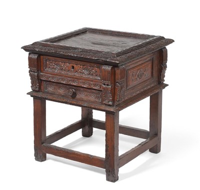 Lot 479 - An Italian Carved Walnut Side Table, with flower carved border above two frieze drawers between...