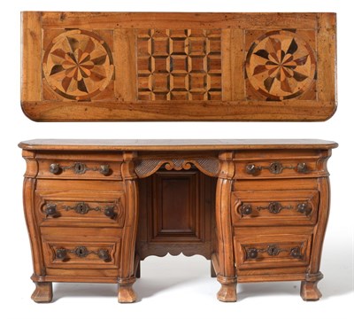 Lot 489 - An 18th Century French Provincial Walnut Bureau or Dressing Table, with an inlaid top over a...