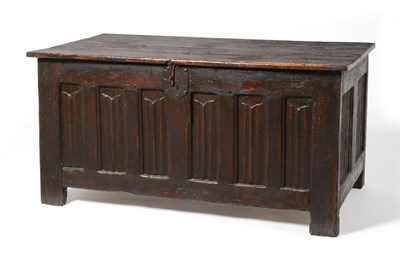 Lot 507 - A 16th Century Joined Oak Chest, with a boarded lid over six narrow ''parchemin'' panels, on...