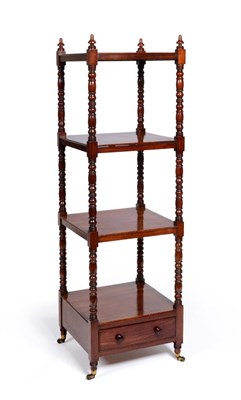 Lot 511 - An Early Victorian Mahogany Whatnot, of four square tiers on ring and baluster turned supports,...