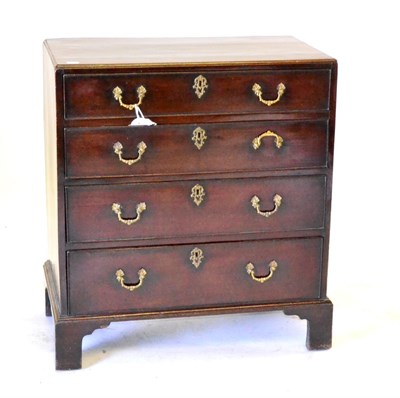 Lot 525 - A Small Mahogany Chest of Drawers, with a caddy top over four long drawers, on bracket feet,...