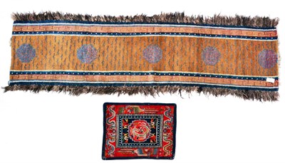 Lot 528 - Narrow Tibetan Runner The tan field with columns of tiger stripes centred by five medallions...