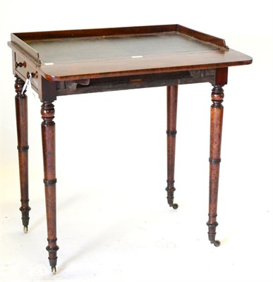 Lot 531 - A Small Regency Mahogany Writing Table, the rectangular top with a three-quarter ledge back and...