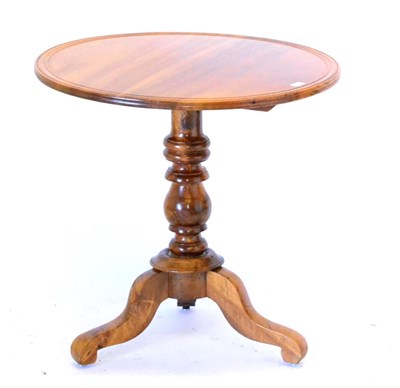 Lot 532 - A 19th Century French Circular Tripod Table, with moulded top above a turned support and three...