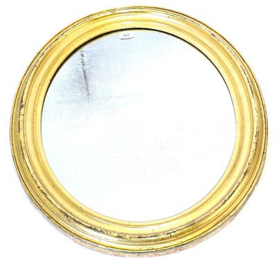 Lot 547 - A 19th Century Gilt Oval Wall Mirror, the tarnished mirror plate within a moulded frame, 79cm...