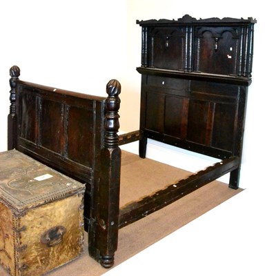 Lot 554 - A Joined Oak Bed Frame, with an arched and pilastered headboard, plain rails and a panelled...