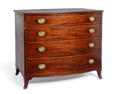 Lot 571 - A George III Mahogany Bowfront Chest of Drawers, with a reeded edge to the top over four long...