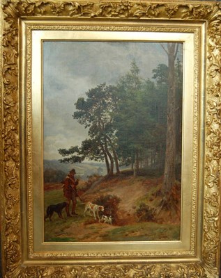 Lot 828 - Basil Bradley RWS (1842-1904) Sportsman holding his gun in a wooded landscape with an English...