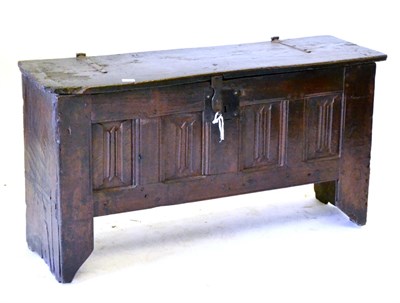 Lot 608 - An Oak Chest, with a hinged lid over four ''parchemin'' carved panels, on stile feet, 17th...