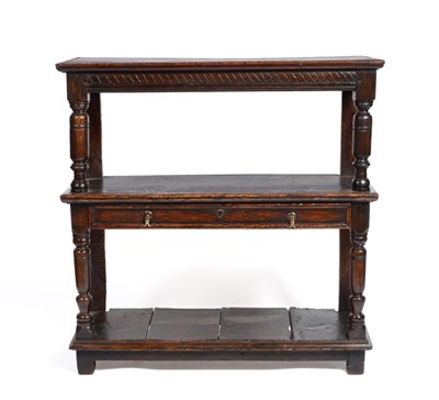 Lot 629 - A Joined Oak Court Cupboard, in three tiers with a drawer to the middle tier, on turned...