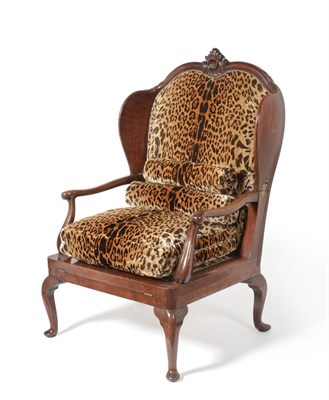 Lot 635 - A Mid 19th Century Walnut Framed Wing Back Chair, later recovered in leopard print fabric, the...