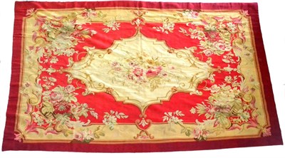 Lot 638 - Mid 19th Century Aubusson Carpet Central France The crimson field with ivory medallions...