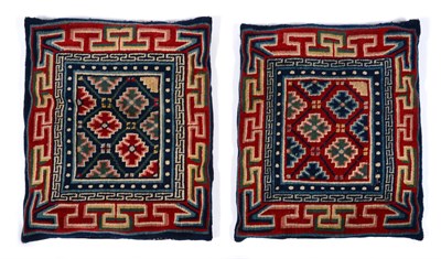 Lot 649 - Pair of Tibetan Saddle Bag Faces Each with a stepped lattice deep indigo field containing...