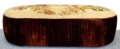 Lot 650 - A Large Ottoman, rectangular with rounded ends, the top covered in 19th century floral woollen...