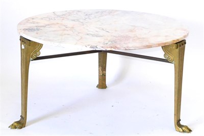 Lot 655 - A Circular Pink Veined Marble Top Coffee Table, raised on three brass tapering legs with lion...