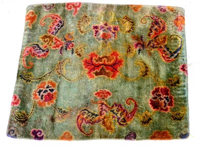 Lot 668 - Tibetan Silk Rug Fragment Central/Southern Tibet The apple green field with bat wings and...