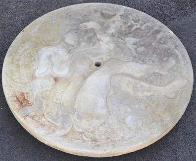 Lot 726 - A Circular Concrete Table Top, decorated in relief with a nude female and stylised flowers,...