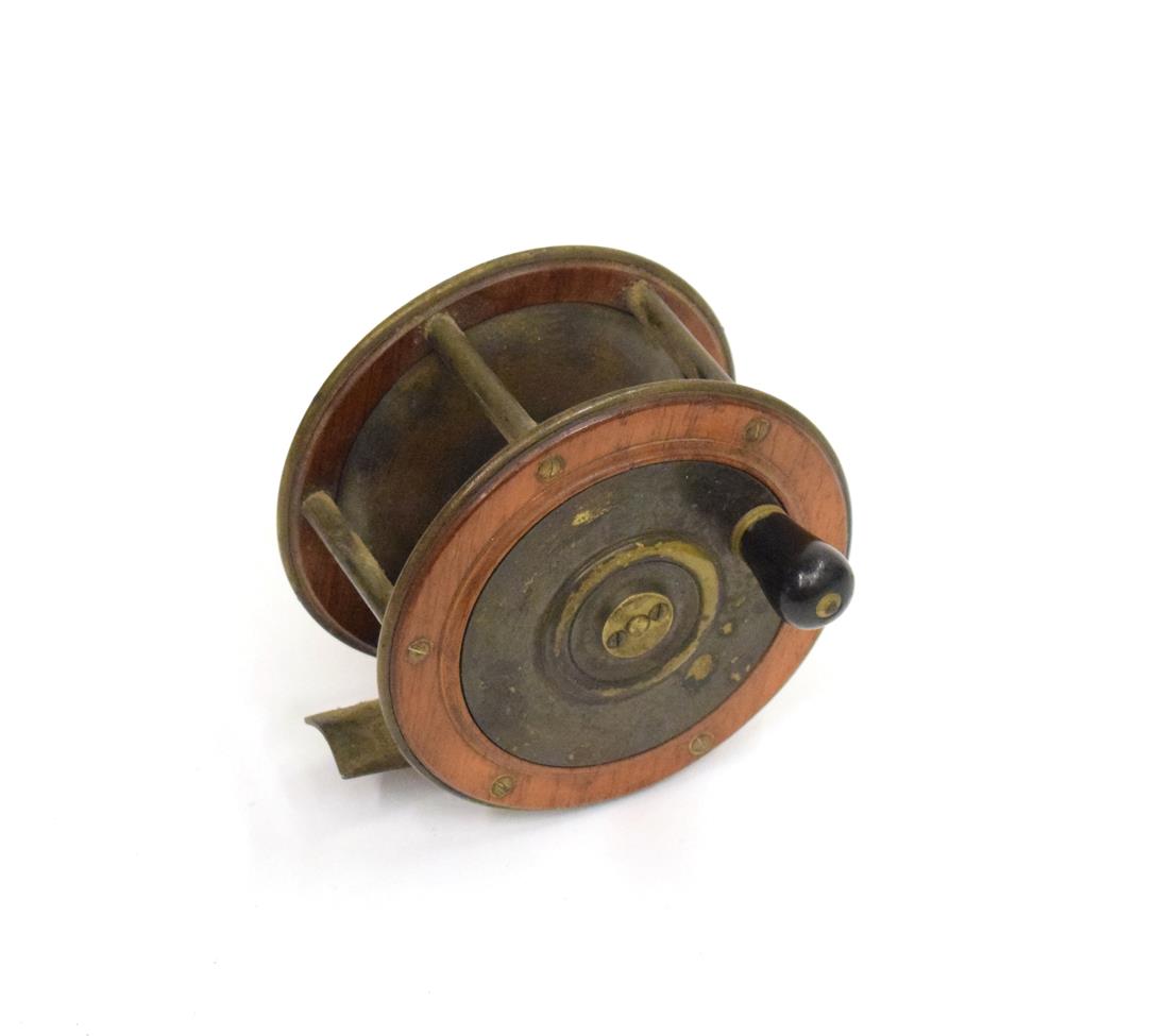 Lot 3058 - A Victorian 4 in. Teak (?) and Brass Platewind Salmon Fly Reel, smooth brass foot, ebony handle