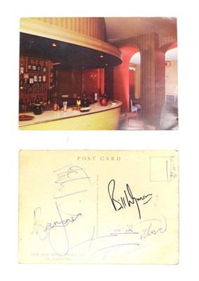 Lot 3092 - Rolling Stones Signatures a postcard hand signed by four of the Rolling Stones: Mick Jagger,...