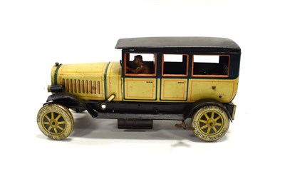 Lot 3397 - Distler Limousine yellow/black, with electric lamps to front, clockwork motor, battery holder...