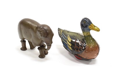 Lot 3399 - Hess Friction Tippu-Tipp Duck together with a Cast-iron walking elephant (2)